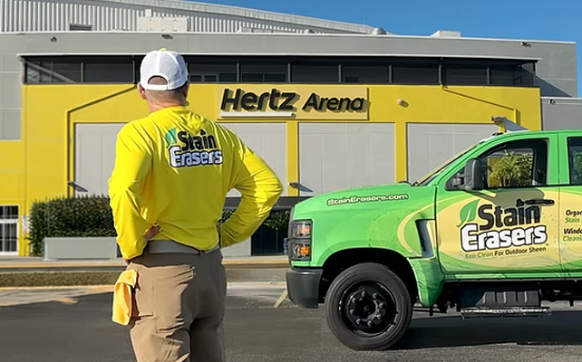 Stain Erasers technician and truck at a commercial property